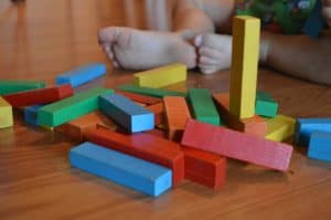 kid playing with blocks