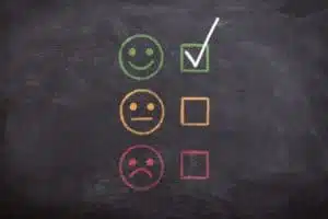 whiteboard with smiley faces on it