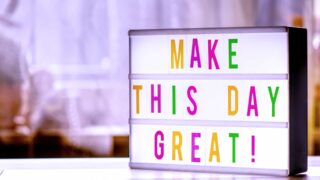 photo of a sign that says make today great
