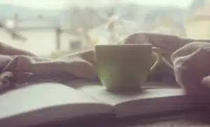 photo of tea sitting on a book